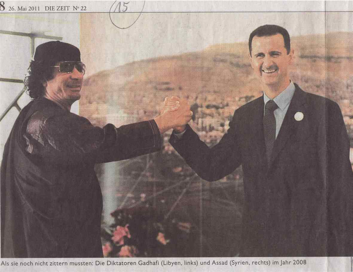 Gaddafi unf Assad beim Handschlag